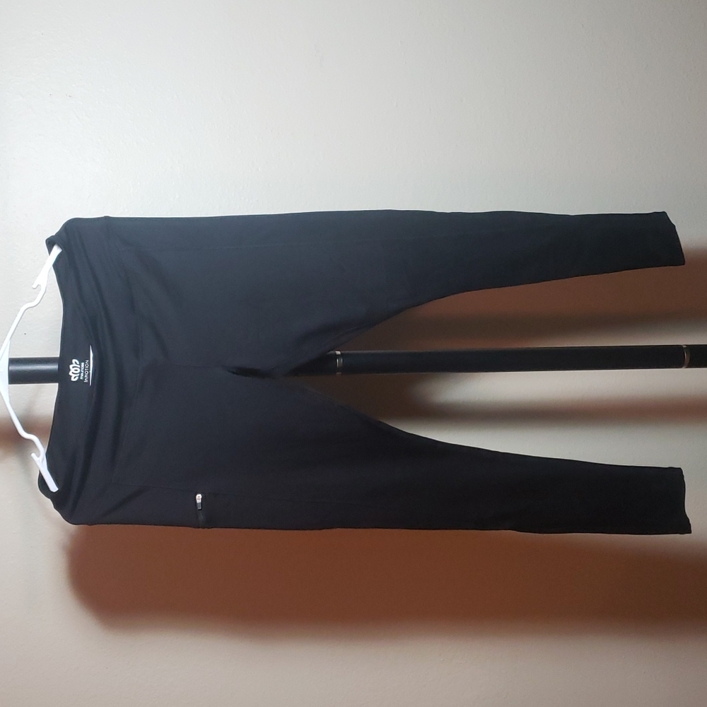 Black leggings with zipper pocket size large and small pocket in waist band.